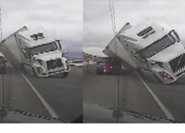 بالفيديو.. شاحنة ضخمة تحطم سيارة شرطة