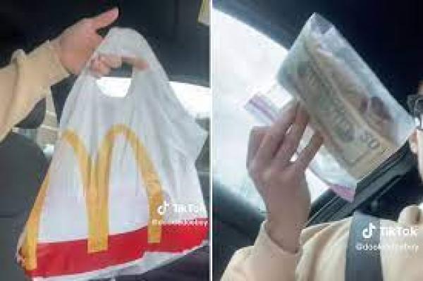 يعثر على 5 آلاف دولار بالخطأ مع"سندويش نقانق" من ماكدونالدز(فيديو)