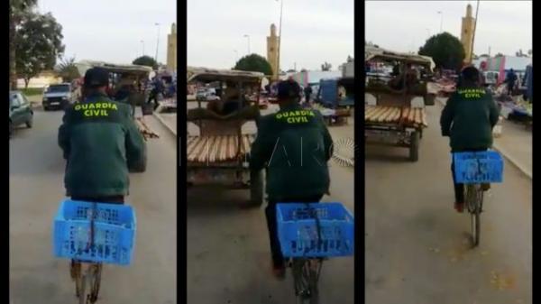 مغربي يقود دارجة هوائية بلباس "غوارديا سيفيل" يثير السخرية على مواقع التواصل (فيديو)