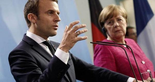 العلاقات الأوروبية الأمريكية على المحك...ماكرون وميركل ينتظران توضيحات من واشنطن بشأن التجسس على الأوروبيين