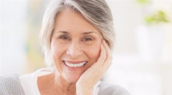 بعد انقطاع الدورة الشهرية.. اهتمي بصحة أسنانك