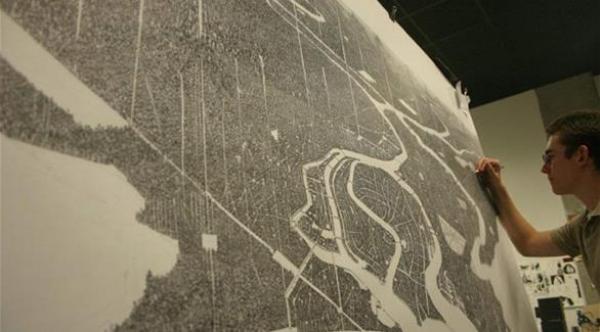 بالصور.. شاب أمريكي يرسم مدناً مذهلة بأدق تفاصيلها