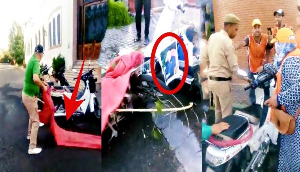 بالفيديو: "نافذ" بمراكش يقوم بتصرف أرعن تجاه "العلم الوطني" وصورة "الملك" أمام أعين السلطات