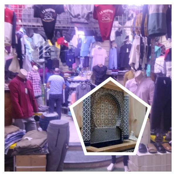 سقاية البرادعيين بعد تحويلها إلى متجر لبيع الملابس