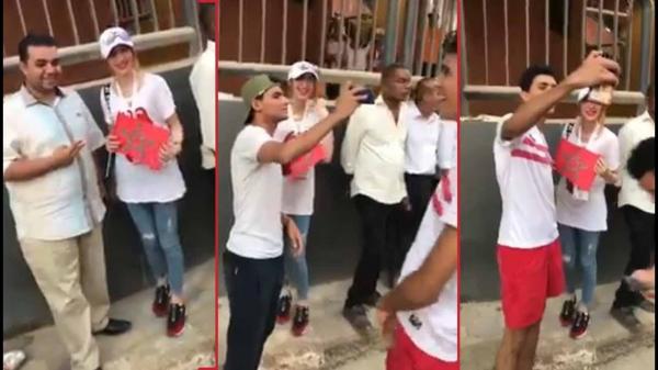 بالفيديو: مصريون يتناوبون لالتقاط صور مع مشجعة مغربية