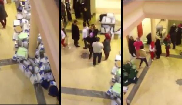 موظفون بمحكمة قضاء الاسرة بسلا يجلون الملفات و المستندات من مياه الفيضانات مخافة تلفها