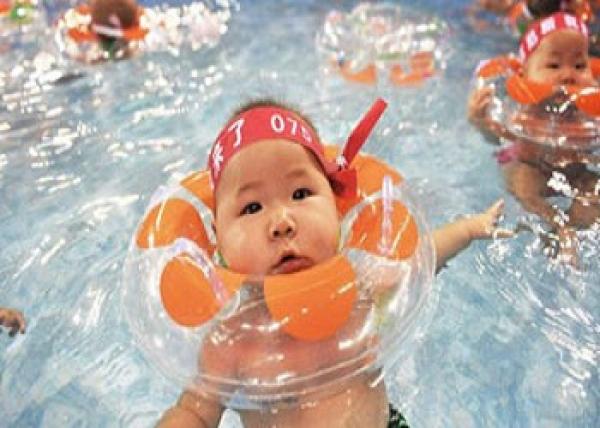 تشيجيانج الصينية أول مقاطعة تخفف سياسة الطفل الواحد