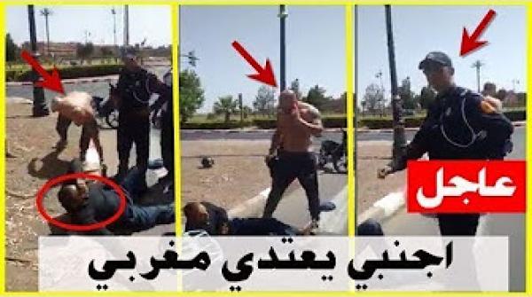 أجنبي يعتدي على مواطن مغربي أمام رجال الامن في مراكش