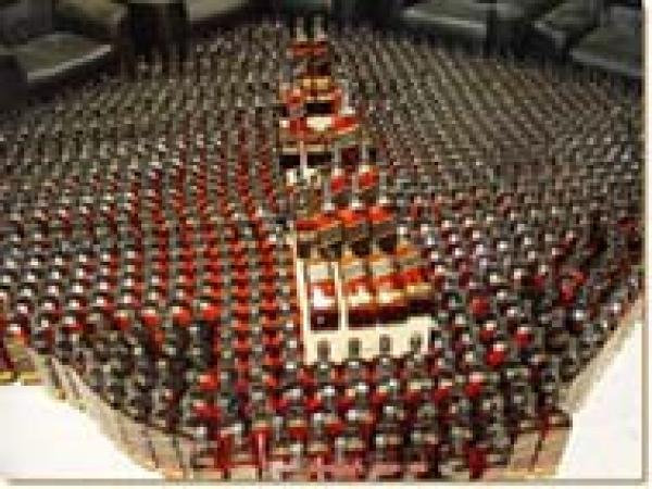 صفقة خمور سرية تقود مدير سوق ممتاز، وموظف ببريد المغرب إلى العدالة بأكادير