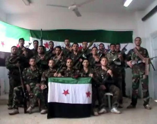 التليفزيون السوري يعلن رصد الحكومة مكافأة لمن يسلمها «إرهابيين غير سوريين»