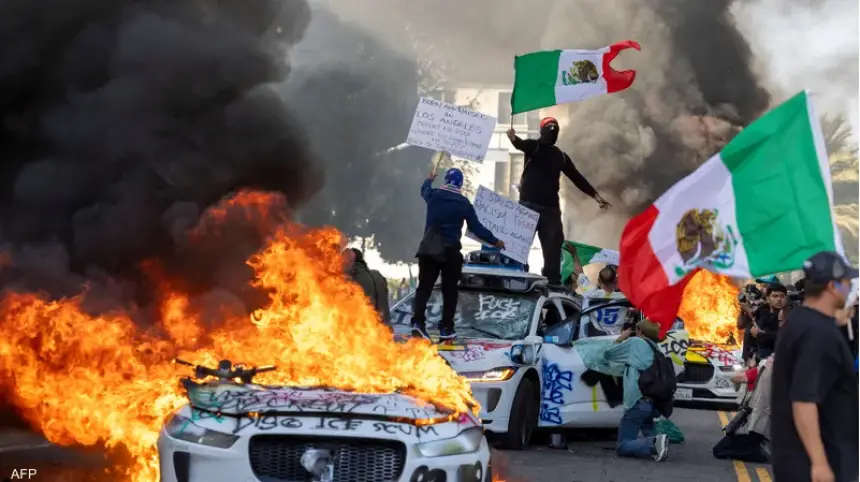 أمريكا على صفيح ساخن.. المظاهرات تمتد لـ12 مدينة والجيش يتدخل