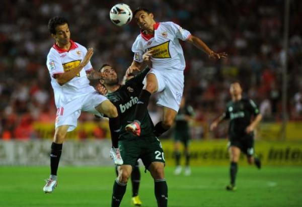 هزيمة اشبيلية تقرع أجراس الخطر بنادي ريال مدريد ونزهة برشلونية في خيتافي 