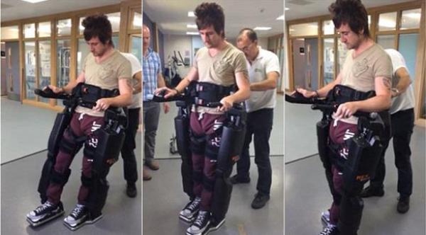 بدلة آلية تعيد لشاب مشلول قدرته على المشي