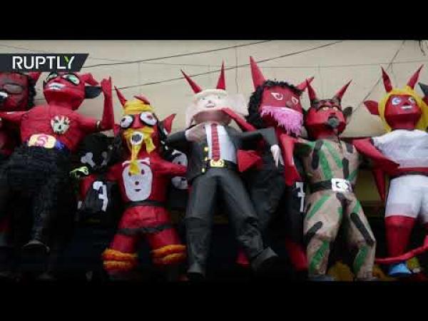 بالفيديو: سكان غواتيمالا يحرقون "دمى ترامب وإبليس"