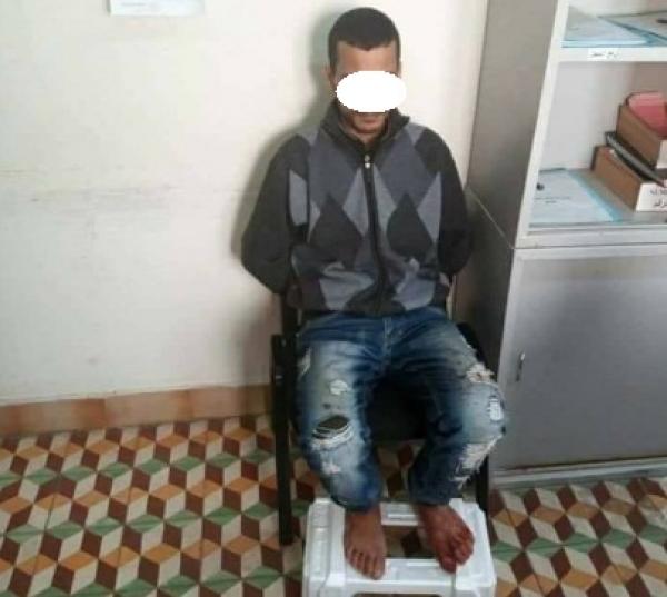 القاتل لحظة اعتقاله