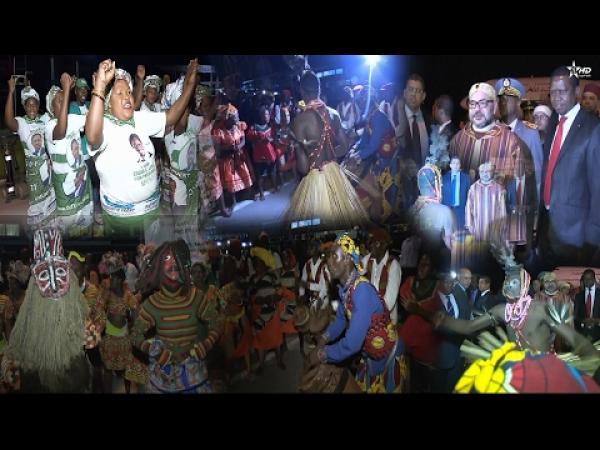 شاهد الملك محمد السادس يستمتع بالرقصات و الايقاعات الافريقية الزامبية
