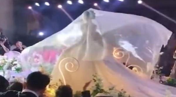 بالفيديو: غطاء رأس العروس "الطائر" صيحة جديدة تجتاح الإنترنت