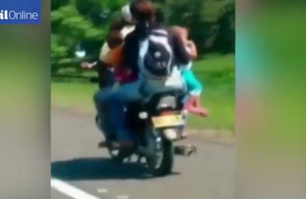 بالفيديو: عائلة كاملة تركب دراجة نارية واحدة
