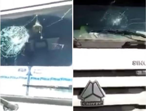 شخص في حالة غير طبيعية يُخَرِّبُ واجهة شاحنات بسلا