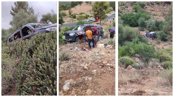 انقلاب سيارة عائلية بمدار سياحي ومواطنون ينقذون سائقها بأعجوبة