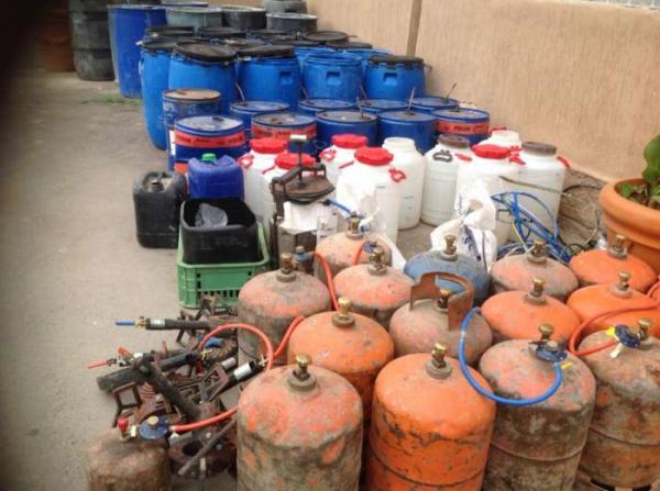 تفكيك عصابة تستخدم  الضفادع و ماء الجير في إنتاج المشروبات الروحية