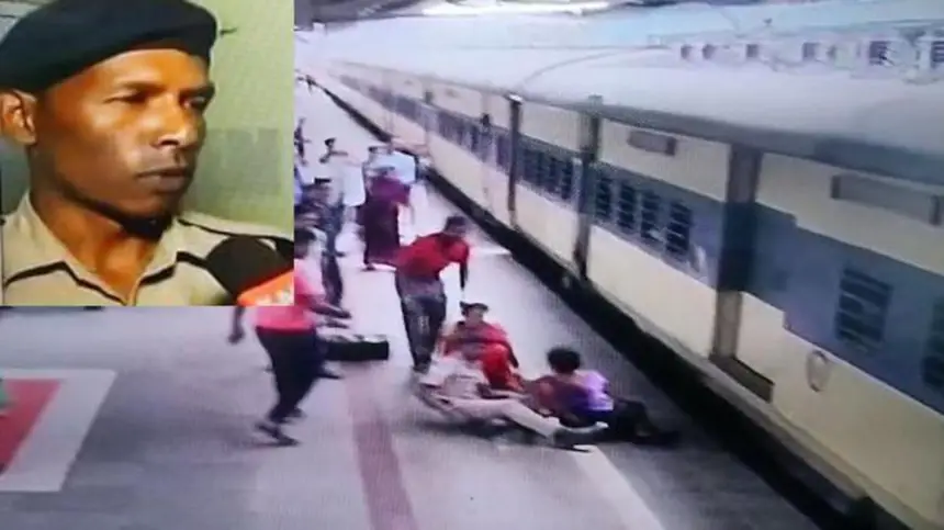شرطي هندي ينقذ فتاة كاد القطار أن يسحقها