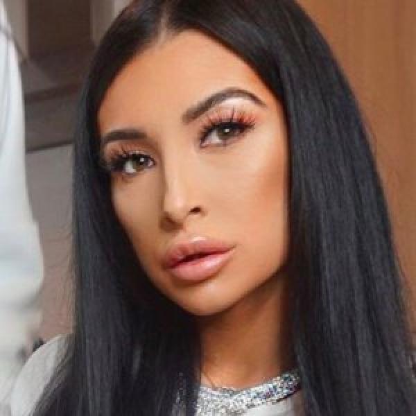 بعد أن كانت مشرّدة.. شبيهة كيم كارداشيان في طريقها للثراء