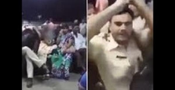 شاهد ماذا حصل لشرطي تحرش بامرأة في محطة القطار (فيديو)