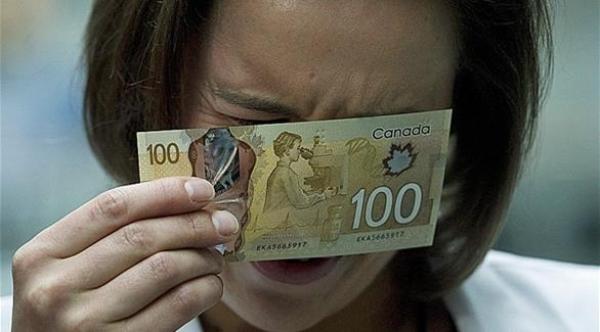 كندا تطبع صورة امرأة ناجحة على ورقة نقدية