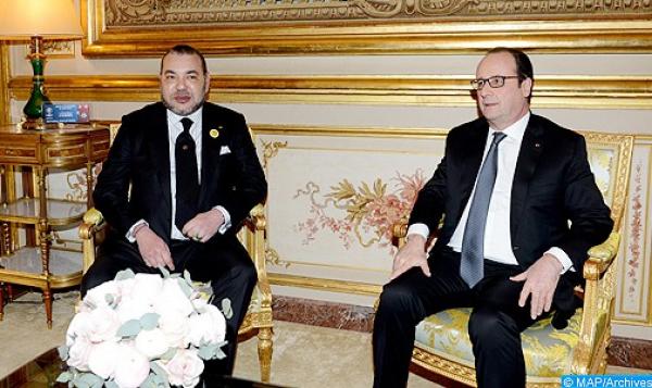 الملك محمد السادس يقيم مأدبة عشاء بباريس على شرف الرئيس الفرنسي