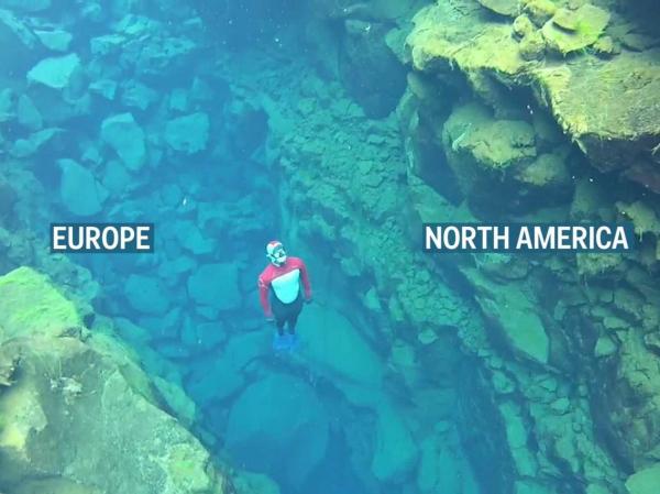 لقطات مذهلة لغواصين يسبحون في أصفى مياه بالعالم توجد بين قارتين (فيديو)