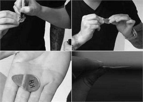 بالفيديو: بريطاني يذيب عملة معدنية بيديه العاريتين