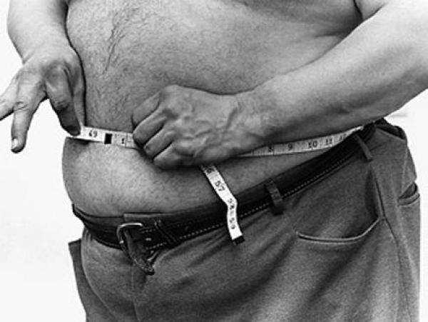 البدناء أكثر إصابة بآلام العمود الفقري