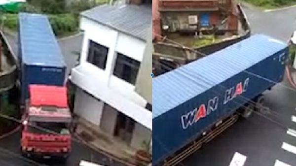 بالفيديو: سائق ماهر يعبر بشاحنته فتحة ضيقة بين مبنيين