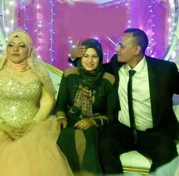 زوجة تشارك زوجها في حفل زفافه على امرأة ثانية .. التفاصيل