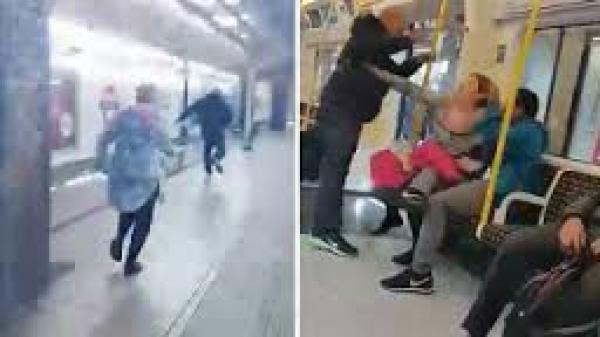بريطاني يصفع مهاجر أجنبي بدون سبب داخل قطار.. وامرأة تلحق به لتمسكه