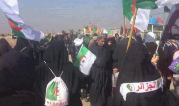 شيعة الجزائر رفعوا العلم الوطني في سماء كربلاء لأول مرة