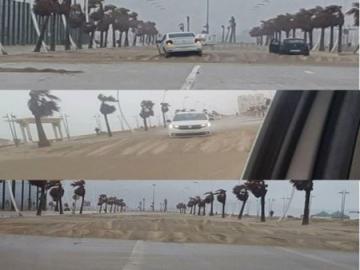 زحف رملي بسبب الرياح القوية يحول كورنيش مارتيل إلى صحراء