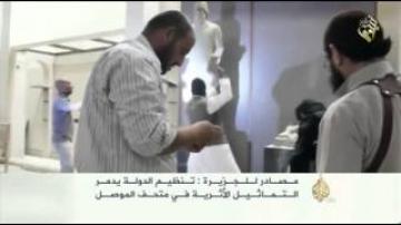 داعش يحطم كل التماثيل الأثرية في متحف الموصل - العراق