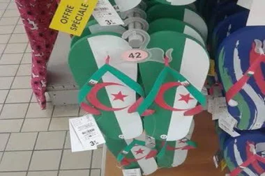 غضب عارم بالجزائر بعدما اعتبروه تدنيسا متعمدا لعلمهم الوطني بفرنسا