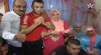 هكذا عاشت عائلة الملاكم المغربي محمد ربيعي و أبناء حيه النزال النهائي