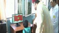 الملك محمد السادس يصحح لطفل رسم العلم المغربي بطريقة خاطئة