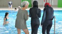 محكمة ألمانية تلغي حظراً على ارتداء "البوركيني"