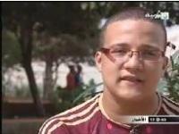 رجل بدون أيدي ولا أرجل بطل كراطي
