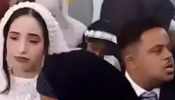 العريس مصاب بمتلازمة داون.. بكاء عروس في حفل زفافها يثير جدلا واسعا على مواقع التواصل (فيديو)