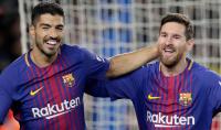 ميسي يدعم سواريز لتجديد عقده مع برشلونة