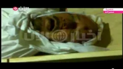 صور حصرية لتجهيز جثة القذافي 