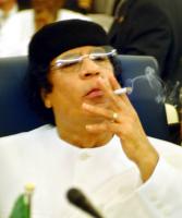 القذافي يتعهد بدحر القوات الدولية  