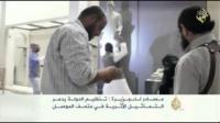 داعش يحطم كل التماثيل الأثرية في متحف الموصل - العراق