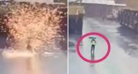 صاعقة تضرب رجلا أثناء مشيه حاملا مظلة(فيديو)
